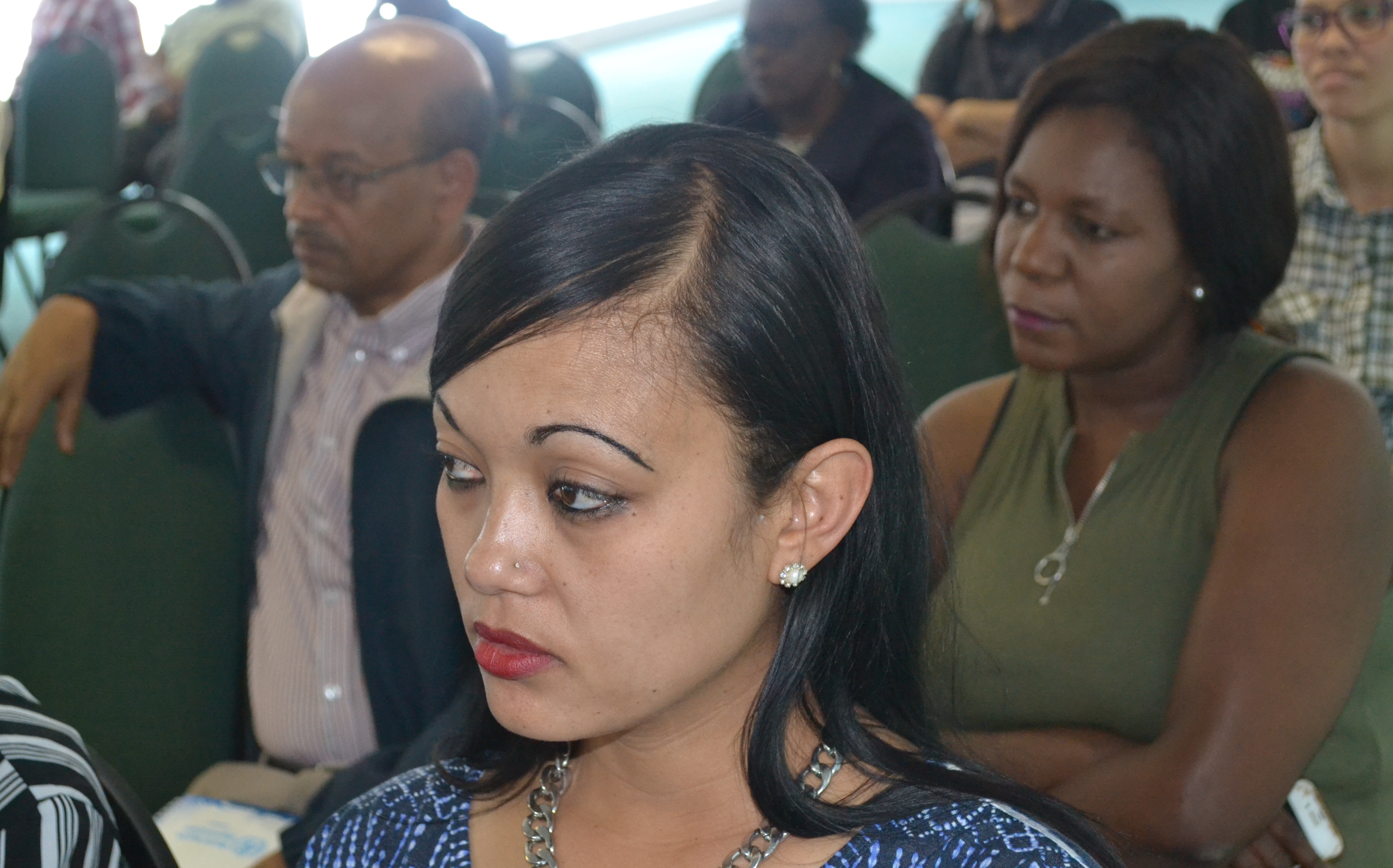 Letisia from UNFPA listening attentively to the presentations on mental health