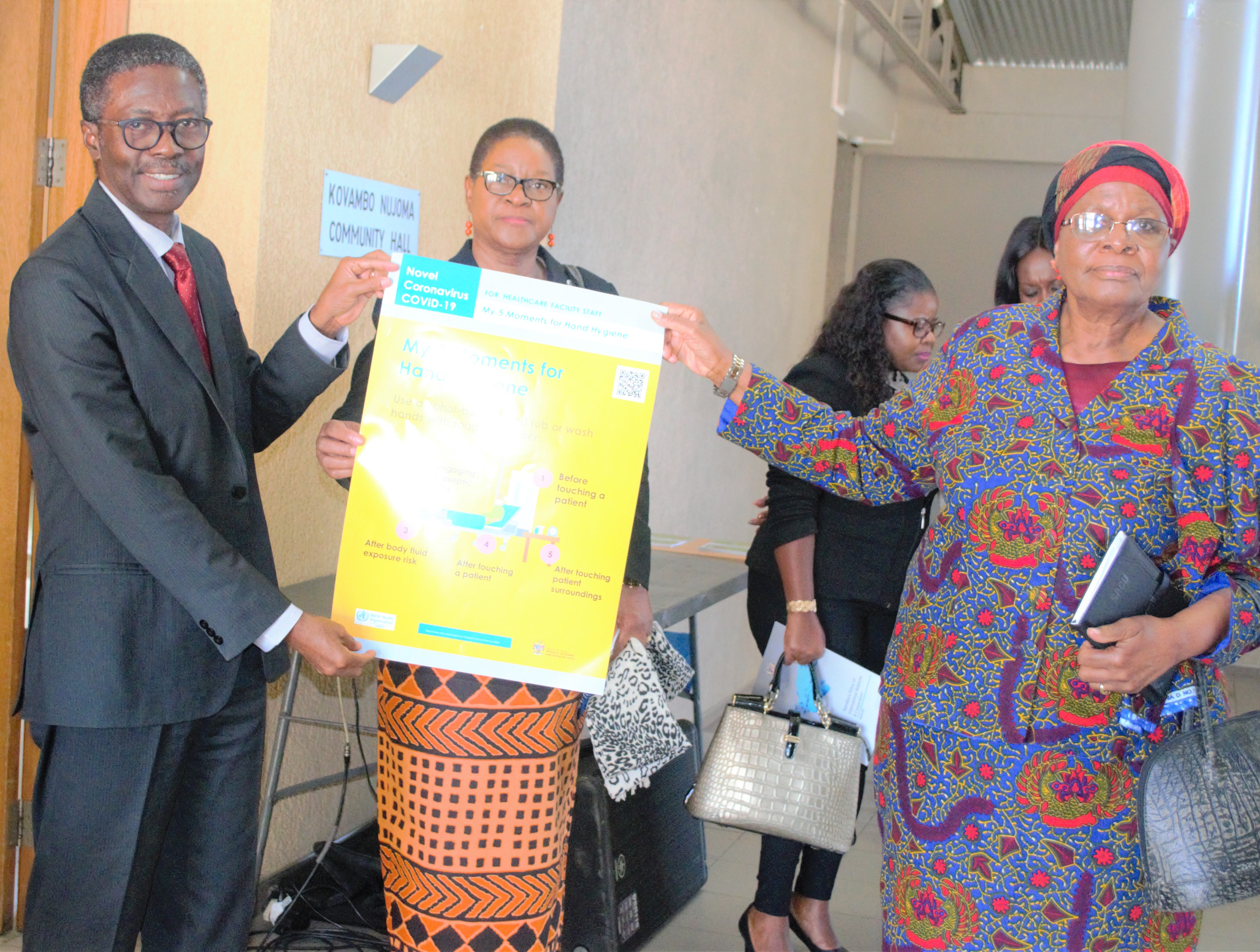 WHO Representative, Dr Charles Sagoe-Moses and UNICEF Representative, Mrs Rachel Odede handing over infection prevention and control materials for health workers to the Deputy Prime Minister and Minister of International Relations, Right Honorable Netumbo Nandi-Ndaitwah 