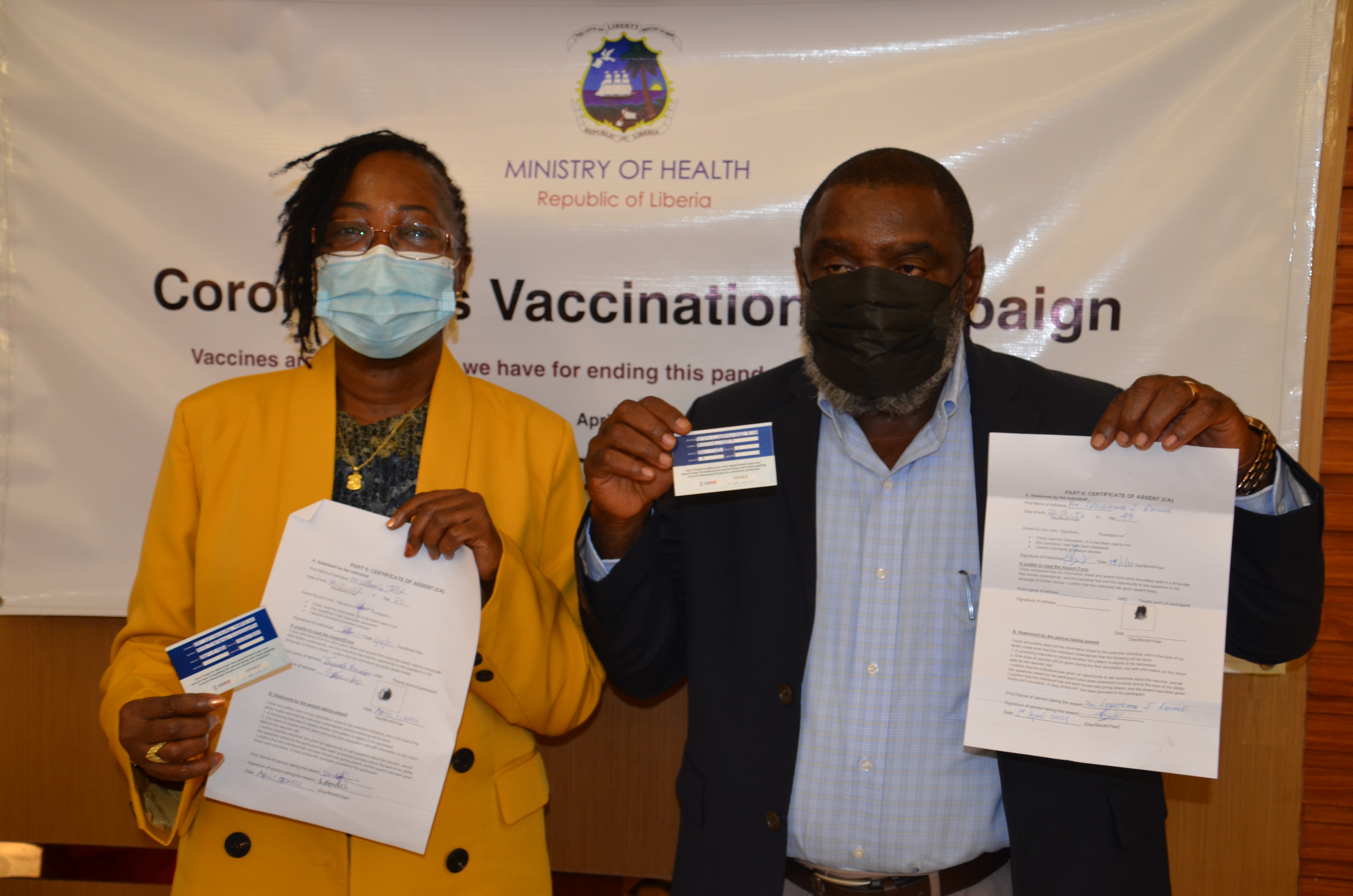 Health Minister Dr. W.Jallah and Information Minister after receiving COVID-19 Vaccine
