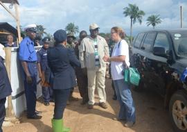 President Koroma and entourage at the Ebola management centre in Kailahun District being briefed by a MSF staff