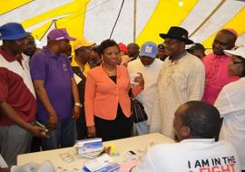The Minister of Health accompanied by the wife of executive governor of Rivers state and chairperson of NIFAA during inspection of an RDT exhibition stand