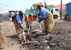 Juba Council employees clean up the city during the public awareness campaign