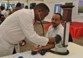 Dr Kesetebirhan Admasu, Minister of Health, gets his blood pressure checked at the launch event on 17 April 2014.