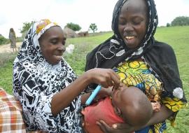 SCDDs personnel immunizing a child