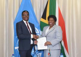 Dr Owen Kaluwa, the World Health Organization Representative in South Africa presenting his credentials to the Deputy Minister of International Relations and Cooperation, Ms Candith Mashego-Dlamini.