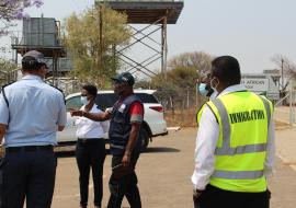 WHO Consultant Dr Raphael John Marfo assesses Sikwane Border Control Post
