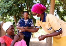 A child receiving polio drops in Dodoma Region