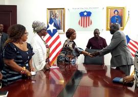 Hon VP, Chief Dr. Jewel Howard Taylor greets WHO Country Representative during the launch of the WBFW in Liberia