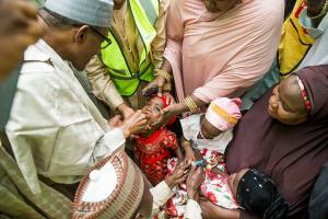 President Muhammadu Buhari vaccinating a child with OPV during the flag off of the Katsina State September 2015 SIPDs at his residence in Daura town on 5th September 2015