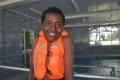 Muaz Reshid with a radiant smile at the hydrotherapy facility.