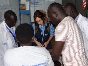 Ms Marina Adrianopoli, Technical Officer for Nutrition, monitoring the utilization of the WHO SAM kits at the IMC clinic in Juba POC