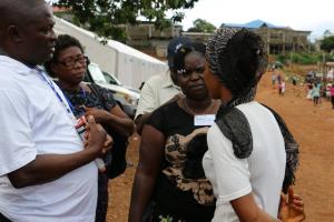 Mental Health Nurses engaging a community member affected by the mudslides disaster