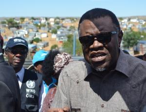 The President of the Republic of Namibia, His Excellency Dr Hage Geingob addressing the community of Havana informal settlement while the WHO Country Representative Dr Charles Sagoe-Moses looks on
