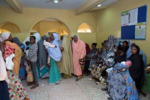 Women with eligible children queue up for routine immunization at health facility in Kaduna.