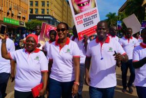   Ministry of Health Officials, Partners and the general public march through the city to create awareness 