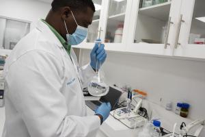 Laboratory Technician working in the new PHL in Zanzibar