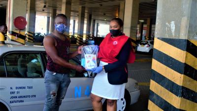 Special outreach to taxi drivers distributing masks, hand sanitizers and leaflets on COVID-19