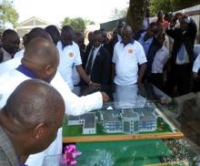 01 the cs is shown a model of the new chronic disease treatment centre in construction at the referral centre