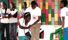 Red Cross Volunteers performing drama on ways  on how exposures to the Ebola virus occur
