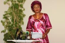 Mrs. Isatou Ida Auber officially opening the meeting at Kairaba Beach Hotel