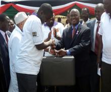 08 mr macharia presents a cryotherapy machine to the governor of uasin gishu at the wcd commemoration event