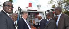 Dr Muhammed Kombo, Lamu county, appreciates the detail in the ambulance donated by WHO, accompanied by from left:  Dr  Joel Gondi, MOH, Dr Hillary Kipruto, WHO, Dr Rudi Eggers, WHO Kenya Country Representative,   Dr Dalmas Oyugi  (Migori county) and Dr Patrick Amoth, MOH, Kenya
