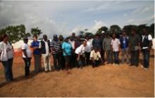 Group photo with official of MoHS, WHO, MSF, UNICEF, civil society groups and local partners in front of Ebola case management centre in Kailahun