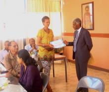 WR Awarding Certificate to Ms Rahwa Solomon, ICT Clerk