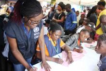 WHO Staff supporting the Cholera vaccination activities in lusaka- Dr. penelope Masumbu at the registration desk