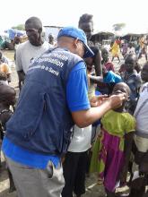 A girl receives a dose of cholera vaccination in South Sudan