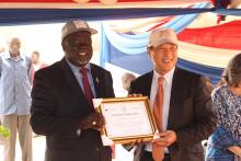 H.E. Seiji Okada, Amb of Japan to South Sudan receiving a certificate of appreciation from Hon MoH.jpg
