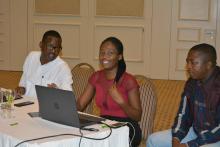 Dr Maina (in white shirt) from the WHO Tobacco Control Programme facilitating a session