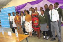 The Minister of Health and the WHO Country Representative with students from Mlumati High School