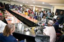 Cross section of dignitaries and journalists at the Press conference