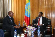 Dr Boureima Hama Sambo, WHO Representative to Ethiopia, discussing with the Ethiopian State Minister of the Ministry of Foreign Affairs, His Excellency Dr Markos Tekle.