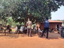 A joint Kagadi district and WHO team interacting with the resistant community on COVID-19. They eventually understood the situation and cooperated fully with the response team.