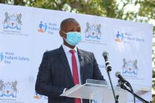 Hon. Minister of Health & Wellness, Dr Edwin Dikoloti giving a speech to commemorate World Patient Safety Day