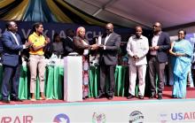 Regional Commissioner for Ruvuma Region receiving an award from attaining the highest COVID-19 vaccine coverage