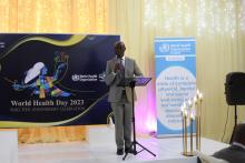 Acting WHO Country Representative, Dr Geoffrey Bisoborwa presenting on WHO major milestones