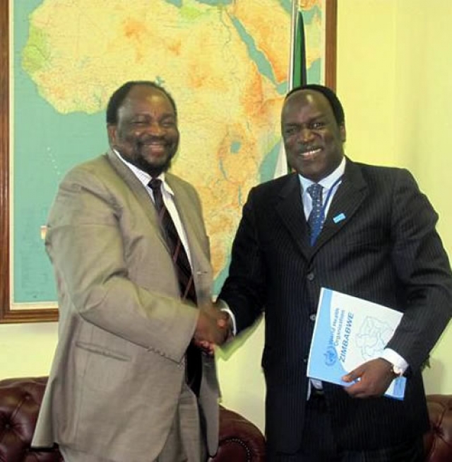 WR Zimbabwe, Dr David Okello and the Honorable Minister of Foreign Affairs Mr Simbarashe Mumbengegwi shaking hands at the accreditation ceremony