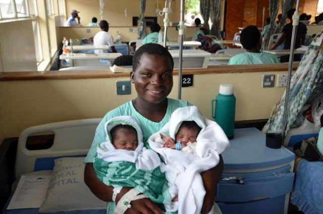 Happy ending: A proud mother of twins after delivering in a health facility with skilled birth attendants