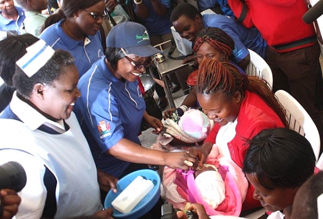 Zambia’s First Lady, Mrs Esther Lungu administers oral polio vaccine to a baby at the AVW regional launch in Lusaka