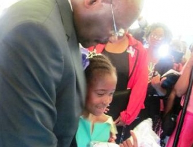 The first 10 year old girl to receive the HPV vaccine in Zimbabwe with Hon. Minister Parirenyatwa