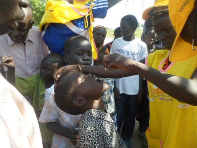 A child getting vaccine in the special vaccination post in Unity