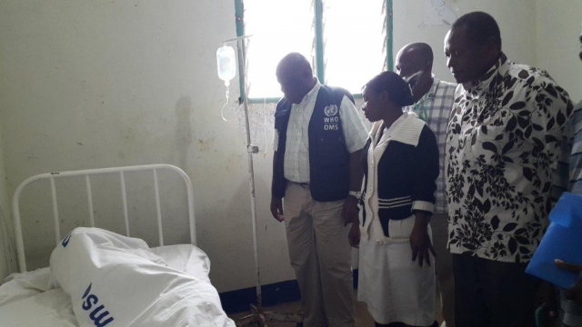 WHO Representative visiting one of the Cholera patients in one of the CTCs in Butiama District Council