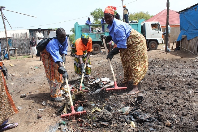 Juba Council employees clean up the city during the public awareness campaign