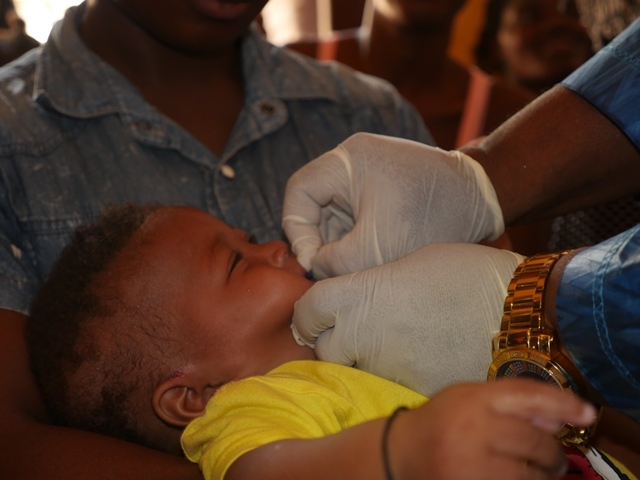 A child receiving Vitamin A supplementation during the campaign