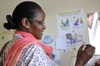 Amina Ismail, a surveillance officer in Kenya, visits health care centres, schools, community leaders and traditional healers to build their knowledge of how to identify and report cases of polio.