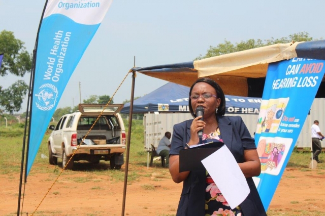 Deputy Director of Health Services-Clinical Dr Velephi Okello delivering remarks of behalf of the Minister during the event.