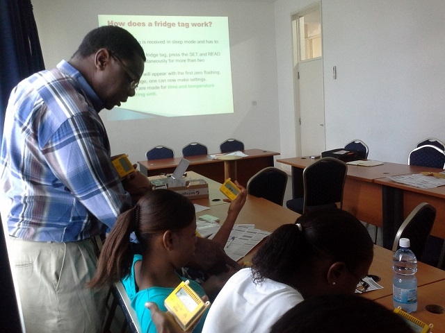 WHO Consultant, Dr Chindedza trains EPI nurses on the use of the Fridge Tag for vaccine temperature monitorin